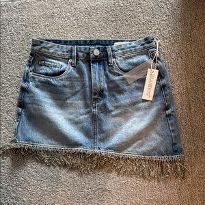 Blank NYC Denim Mini Skirt with rhinestone tassel hem